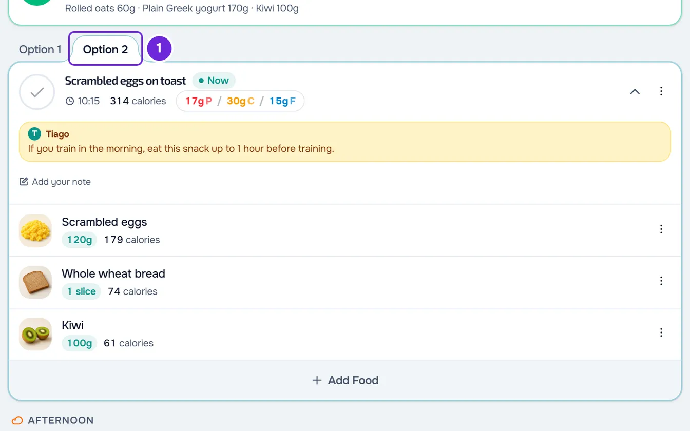 The Option 2 tab chosen on the morning snack: the card is now called Scrambled eggs on toast and shows that option’s foods.